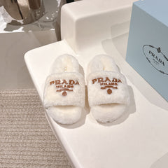 PRADA 25S FLAT MULES IN WHITE RABBIT FUR