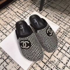 FLAT MULE IN BLACK SUEDE WITH CRYSTALS