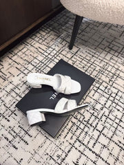 MID HEEL MULES IN WHITE SHEEPSKIN