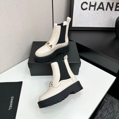 CHANEL 25S SHORT BOOTS IN WHITE CALFSKIN AND CANVAS