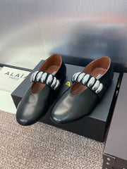 ALAIA MARY JANE FLATS 25S IN BLACK CALFSKIN WITH SILVER HARDWARE