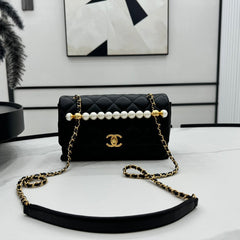CHANEL 25S FLAP BAG 23 CM IN BLACK LAMBSKIN WITH PEARL TOP HANDLE