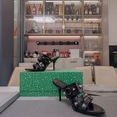 STRAPPY HIGH-HEELED SANDALS IN BLACK STUDDED WAX-OIL SHEEPSKIN