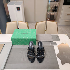 STRAPPY HIGH-HEELED SANDALS IN BLACK STUDDED WAX-OIL SHEEPSKIN