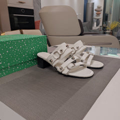 STRAPPY MEDIUM HEELED SANDALS IN WHITE STUDDED WAX-OIL SHEEPSKIN