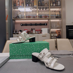 STRAPPY MEDIUM HEELED SANDALS IN WHITE STUDDED WAX-OIL SHEEPSKIN