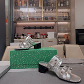 STRAPPY MEDIUM HEELED SANDALS IN SILVER STUDDED WAX-OIL SHEEPSKIN