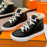 CHEALSEA BOOTS IN BLACK LAMBSKIN AND FLEECE LINING