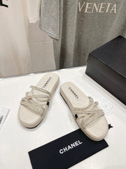 WOVEN STRAP SLIPPERS IN WHITE LAMBSKIN