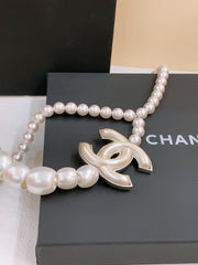 CHAIN BELT IN PEARL AND SILVER METAL