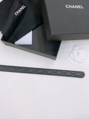 DOUBLE C BELT 20MM IN BLACK CALFSKIN WITH QUILTED STITCHING AND SPIRAL SILVER BUCKLE