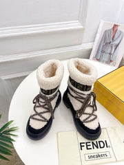 FENDI BOOTS 50MM IN BLACK AND BEIGE SHEARLING AND SUEDE
