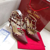 ROCKSTUD SANGRIA RED METALLIC CALFSKIN ANKLE STRAP HIGH SANDAL