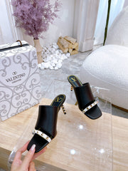 ROCKSTUD TOWER-HEEL MULES IN BLACK CALFSKIN 7 CM