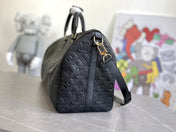 KEEPALL 45 BANDOULIERE MONOGRAM EMPREINTE GIANT