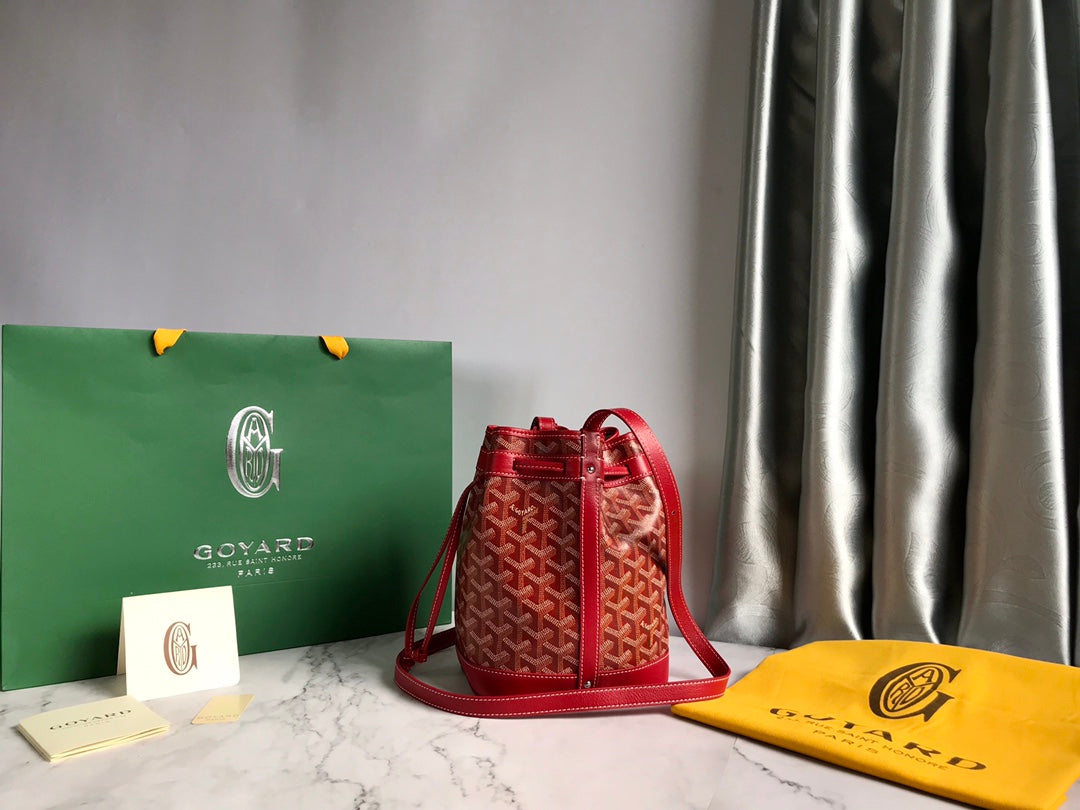 PETIT FLOT BUCKET BAG 22 IN CLASSIC RED GOYARDINE CANVAS AND LAMBSKIN TRIM