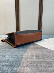 CELINE 25S HORIZONTAL CABAS 43MM IN BLACK TRIOMPHE CANVAS AND TAN BROWN CALFSKIN