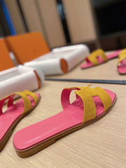 0RAN SANDALS IN DIJON YELLOW SUEDE AND DEEP PINK CALFSKIN