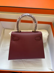 KELLY MINI 20 BAG IN GARNET RED CALFSKIN WITH GOLD HARDWARE