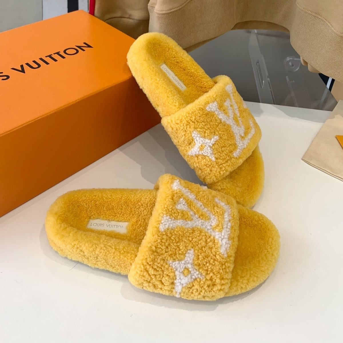 LV WOMEN'S PASEO FLAT SLIPPER IN YELLOW FLEECE WITH WHITE LOGO