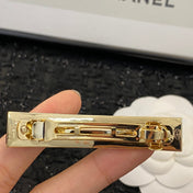 CHANEL 26S CHANEL LOGO LETTER ENAMEL BAR HAIR CLIP IN BLACK ENAMEL AND GOLD METAL 629926