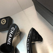 DIAMOND-QUILTED 6 CM SANDALS IN BLACK LAMBSKIN