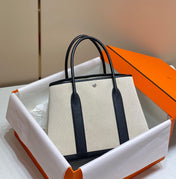 GARDEN PARTY 36CM IN WHITE TOILETS COTTON CANVAS AND BLACK CALFSKIN