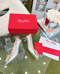 EFFLORESCENCE POINTED-TOE PUMPS IN SILVER SATIN WITH CRYSTAL BUCKLE