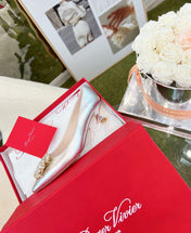 EFFLORESCENCE POINTED-TOE PUMPS IN SILVER SATIN WITH CRYSTAL BUCKLE