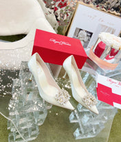 EFFLORESCENCE POINTED-TOE PUMPS IN WHITE SATIN WITH CRYSTAL BUCKLE