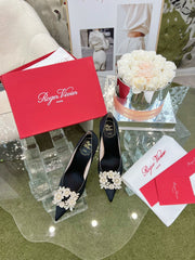 EFFLORESCENCE POINTED-TOE PUMPS IN BLACK SATIN WITH CRYSTAL BUCKLE