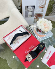 EFFLORESCENCE POINTED-TOE PUMPS IN BLACK SATIN WITH CRYSTAL BUCKLE