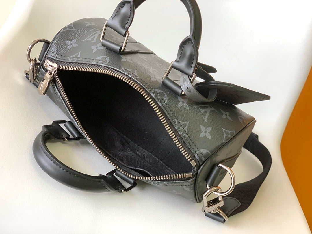 KEEPALL BANDOULIÈRE 25 IN BLACK MONOGRAM HERITAGE CANVAS