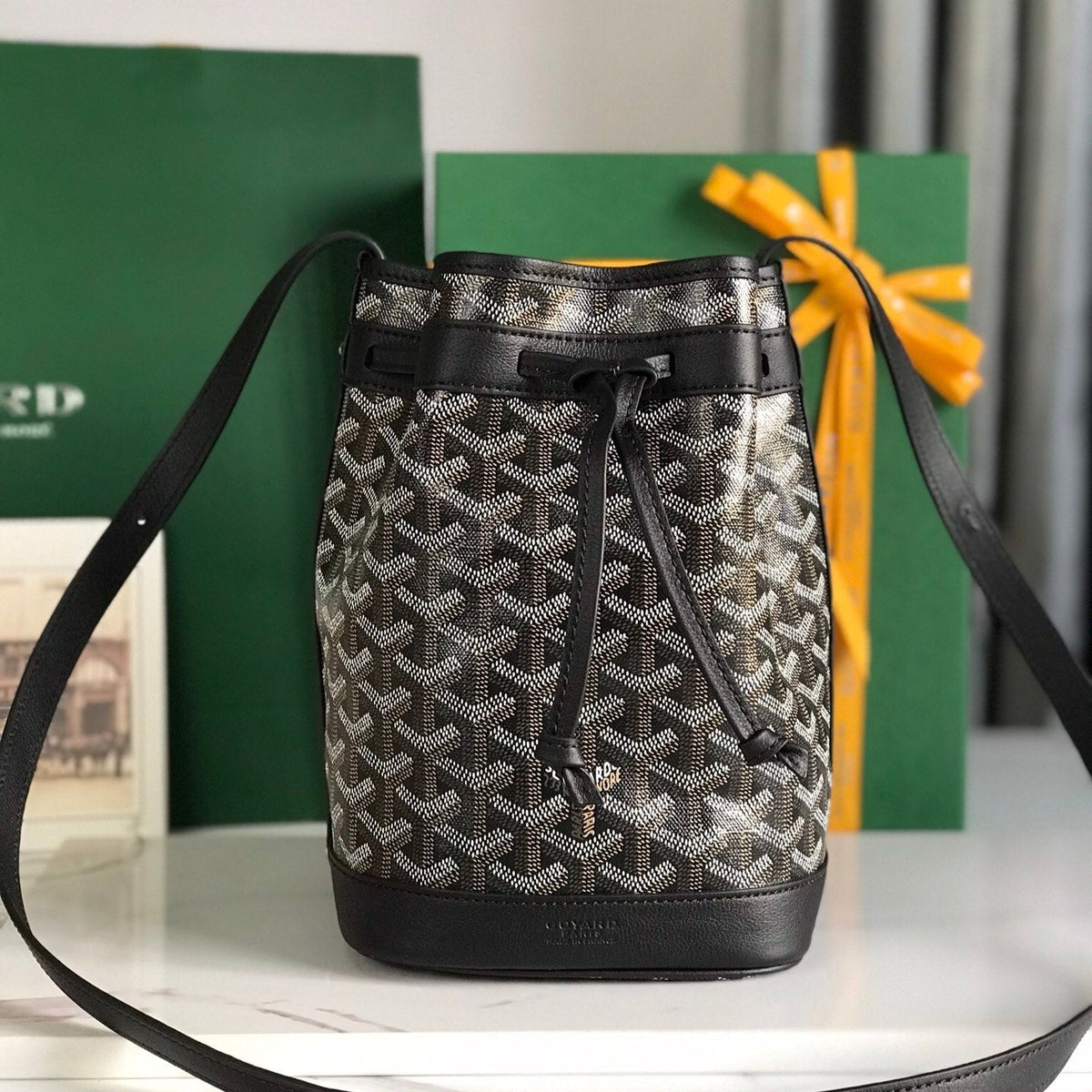 PETIT FLOT BUCKET BAG 22 IN BLACK GOYARDINE CANVAS AND LAMBSKIN TRIM