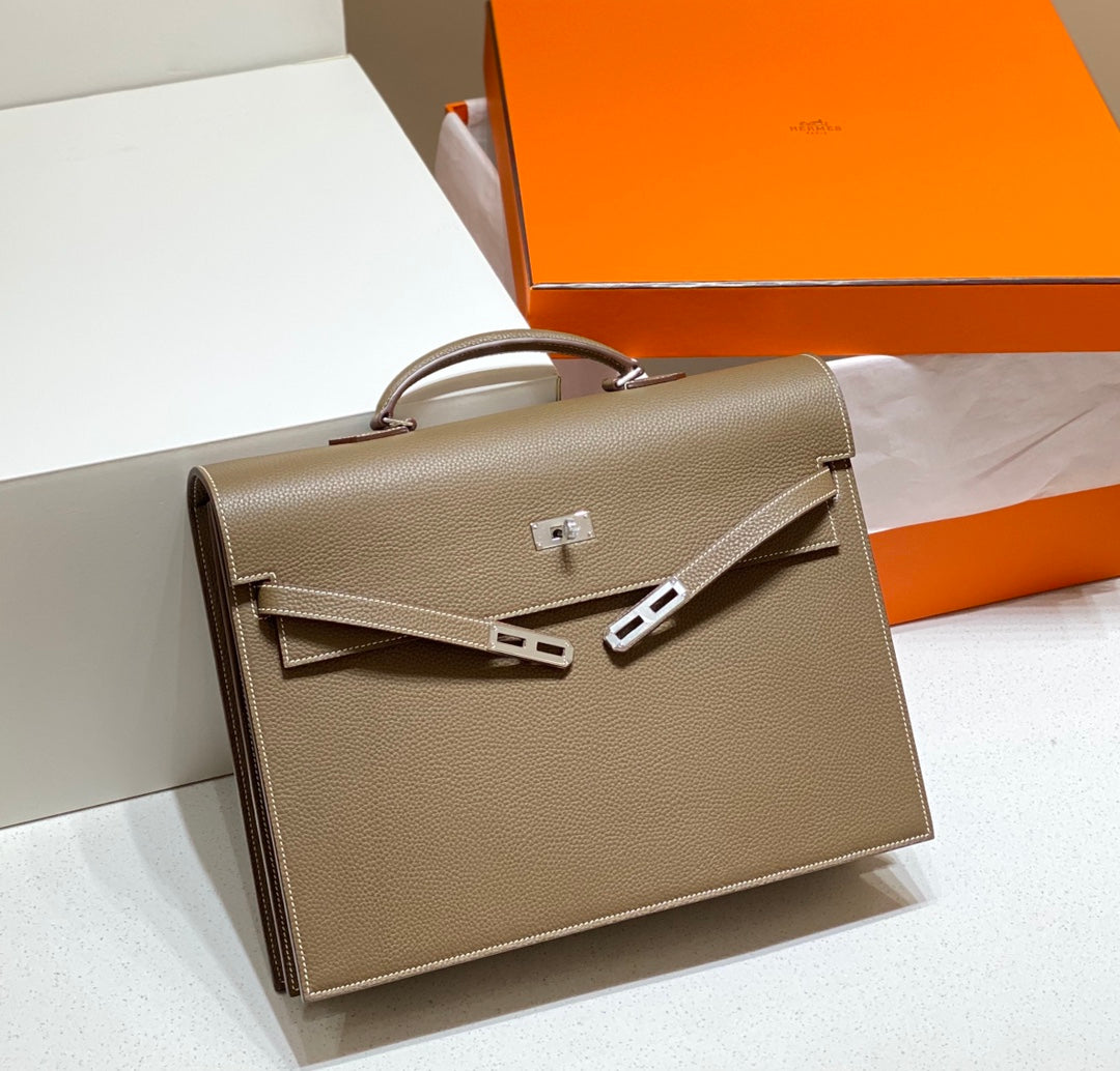 KELLY DEPECHES 38 BRIEFCASE IN ETOUPE TOGO CALFSKIN SILVER HARDWARE
