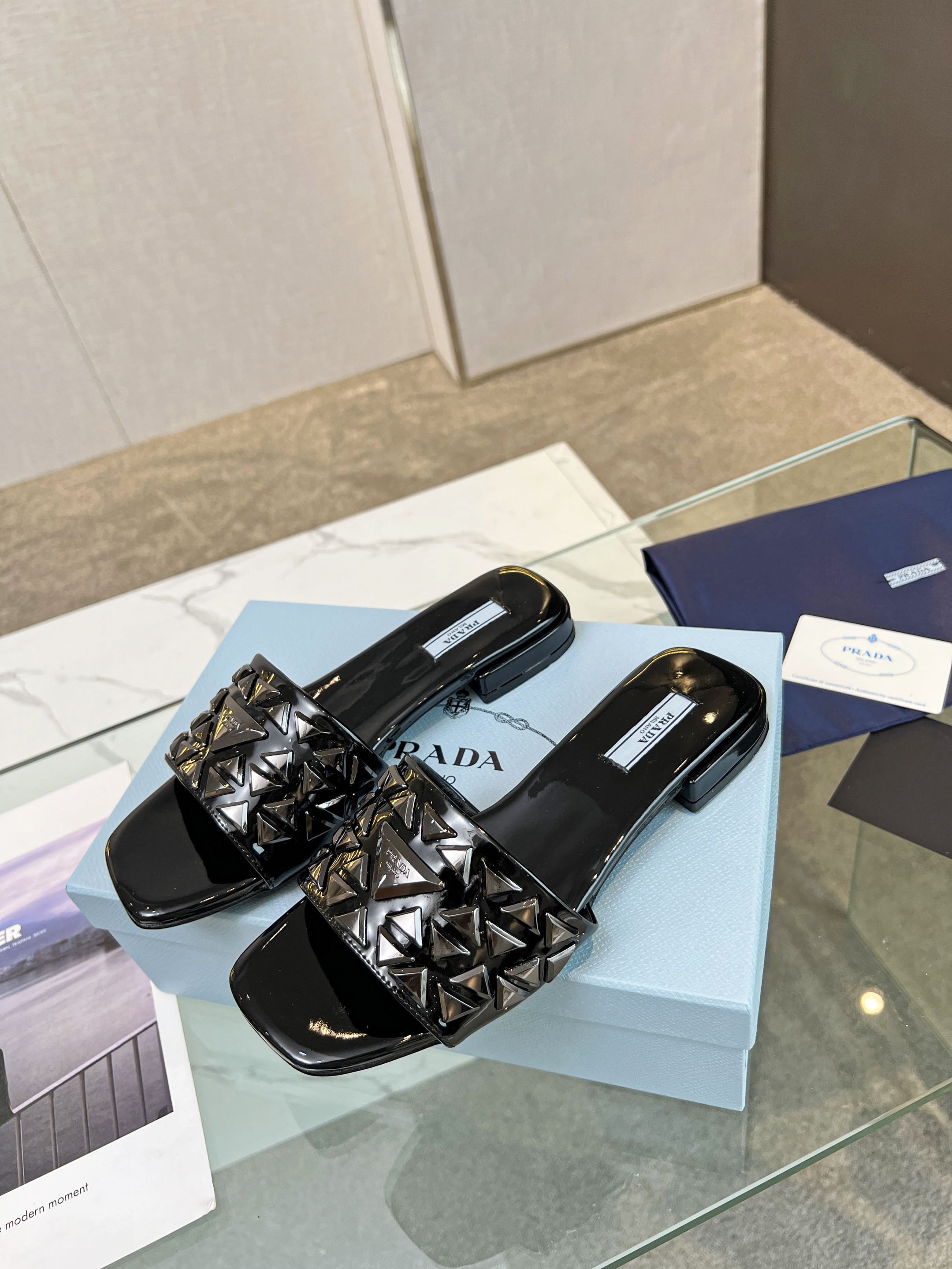 PRA EMBROIDERED SLIDES FLAT BLACK CALFSKIN
