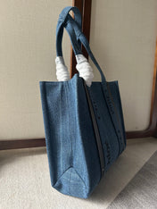 MEDIUM WOODY TOTE BAG 37 IN BLUE DENIM BLACK CALFSKIN