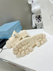 MONOLITH SLIPPER SANDALS IN BEIGE RUBBER