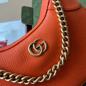 SHOULDER BAG 25 IN ORANGE CALFSKIN GOLD HARDWARE