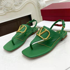 THONG SANDALS IN EMERALD GREEN CALFSKIN WITH GOLD LOGO