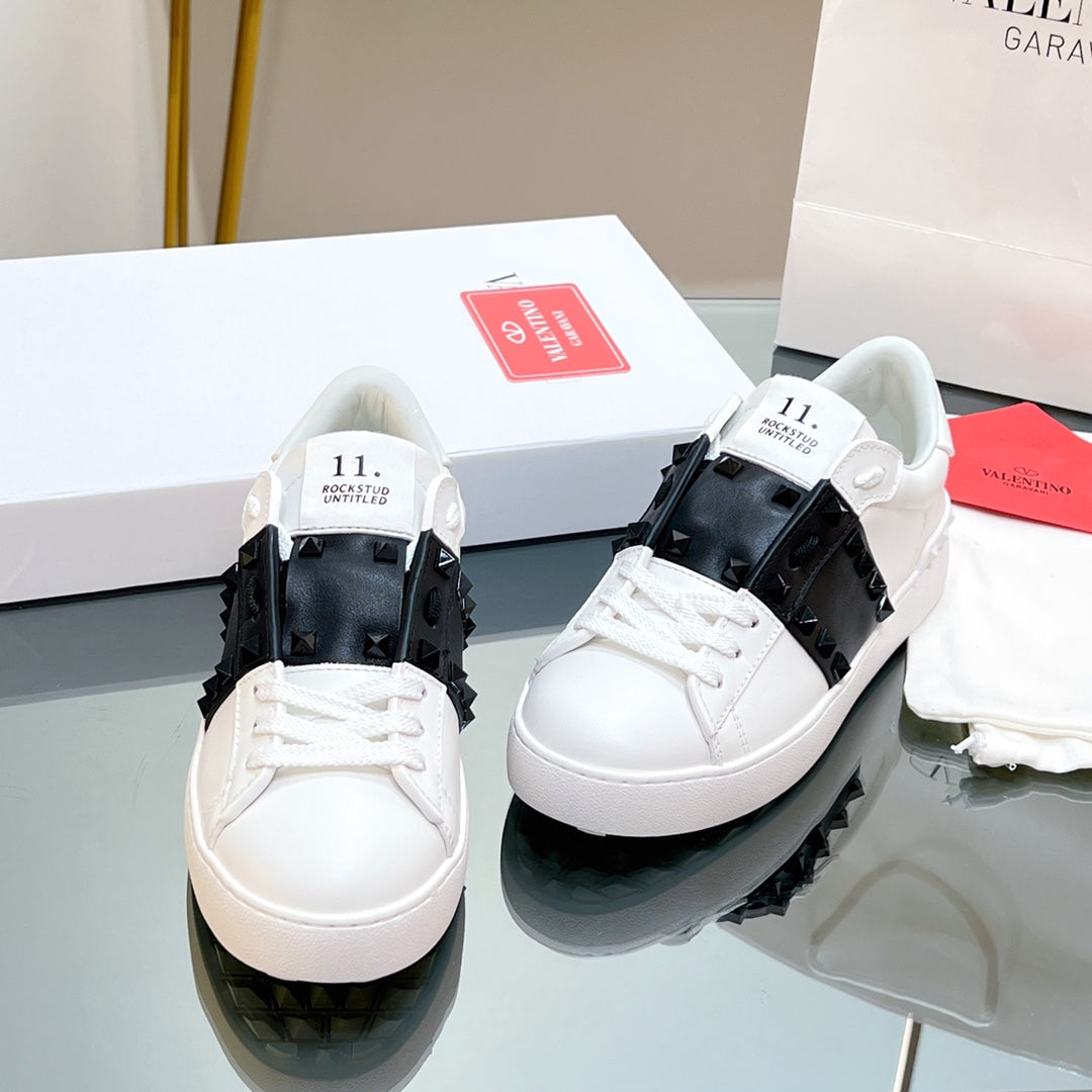 VALENTINO 25S GARAVANI ROCKSTUD UNTITLED STUDDED SNEAKERS IN WHITE MIX BLACK LAMBSKIN
