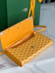 MONTE-CARLO PM CLUTCH 25 IN YELLOW GOYARDINE CANVAS