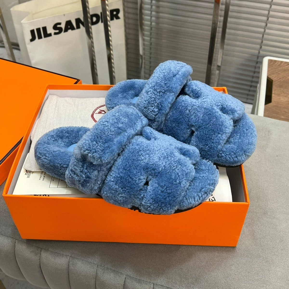 CHYPRE SLIPPERS IN AZURE BLUE LAMB WOOL