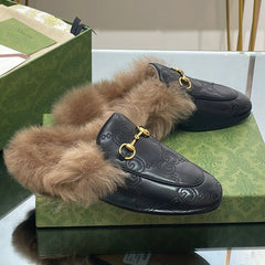 HORSEBIT MULE IN BLACK EMBOSSED CALFSKIN AND LAMB WOOL LINING