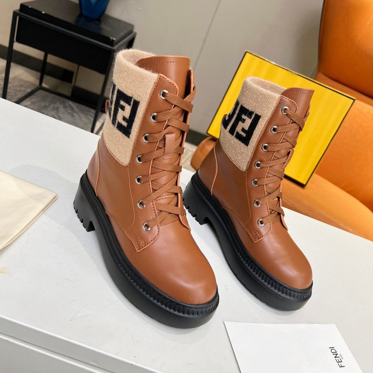FENDI MARTIN BOOTS IN BRONZE BROWN CALFSKIN AND FUR