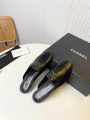 FLAT MULE IN BLACK LAMBSKIN 983818