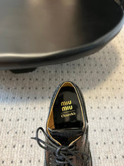 MIUMIU 26S LACE-UP BROGUE LOAFERS IN BLACK PATENT CALFSKIN