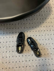 MIUMIU 26S LACE-UP BROGUE LOAFERS IN BLACK PATENT CALFSKIN