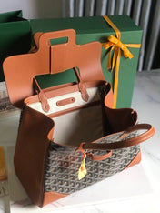 SAIGON SOUPLE BAG 34 IN BROWN GOYARDINE CANVAS AND CALFSKIN