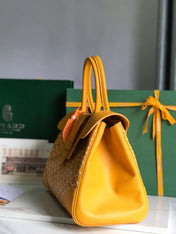SAIGON SOUPLE BAG 34 IN YELLOW GOYARDINE CANVAS AND CALFSKIN